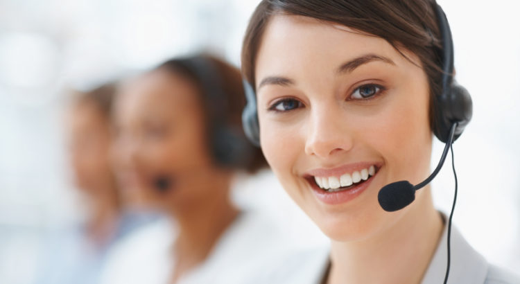 Closeup of a beautiful business customer service woman smiling