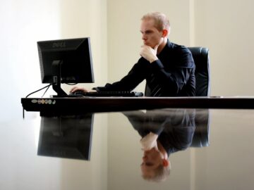Man working on his computer at work