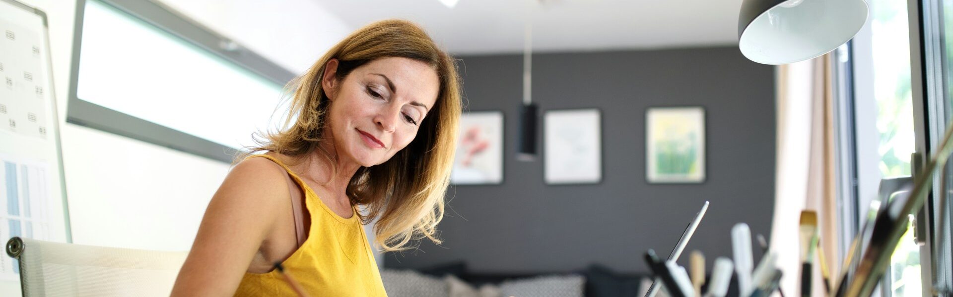 Woman working alone at home office