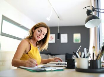 Woman working alone at home office
